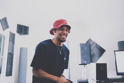 Smiling man looking away in studio