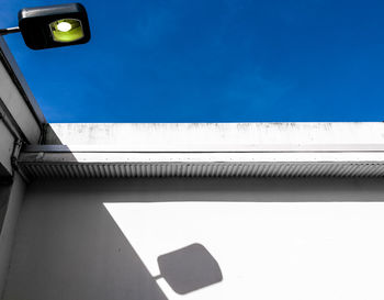 Low angle view of built structure against blue sky