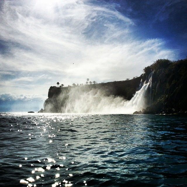 water, sea, wave, waterfront, surf, scenics, motion, beauty in nature, sky, splashing, nature, rippled, rock - object, power in nature, horizon over water, tranquil scene, cloud - sky, idyllic, rock formation, tranquility