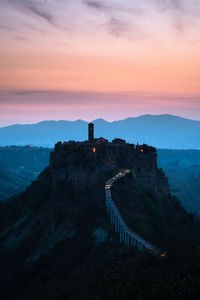 High angle view of castle against sky during sunset