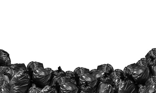 Close-up of garbage against white background