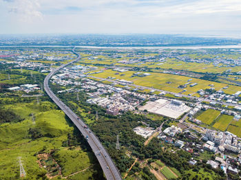 High angle view of road amidst buildings in city