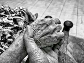 Close-up of person holding hands