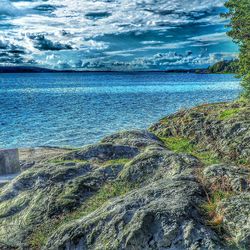 Scenic view of calm sea against sky