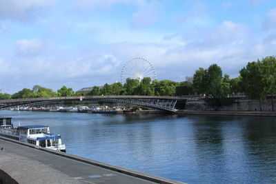 Bridge over river against sky