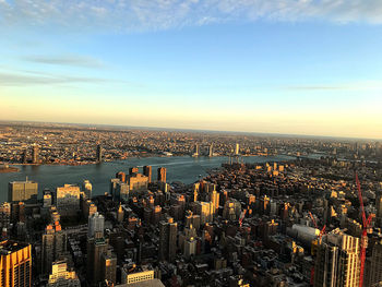 High angle view of city buildings against sky