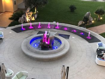 High angle view of illuminated candles in swimming pool