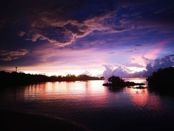 Scenic view of lake against sky during sunset