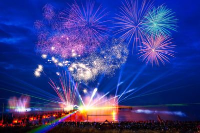 Firework display at night