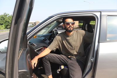 Young man in car