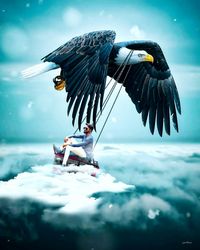 Bird flying over the sea