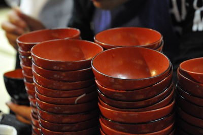 Stacked red soup bowls