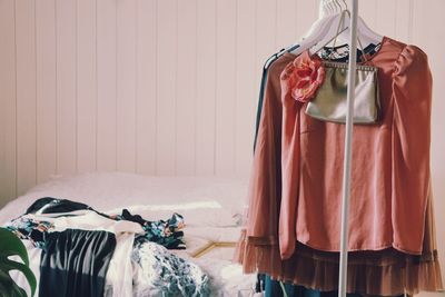 Clothes hanging on rack at home