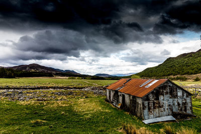 Scenic view of landscape and mountains against sky