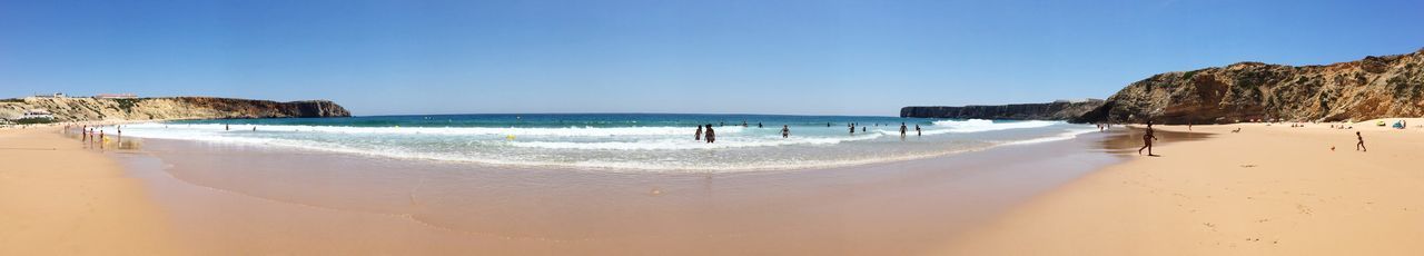 Panoramic view of sea against clear sky