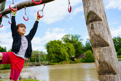 Climbing on the playground outside