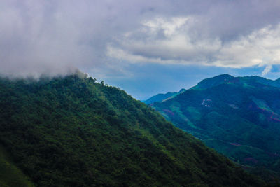 Scenic view of mountains against sky