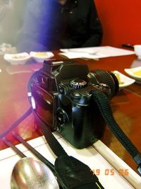 High angle view of camera on table