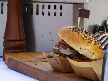 Close-up of burger on cutting board