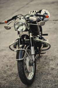 Close-up of bicycle parked on street