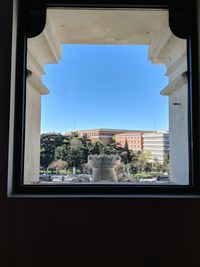 Buildings seen through window