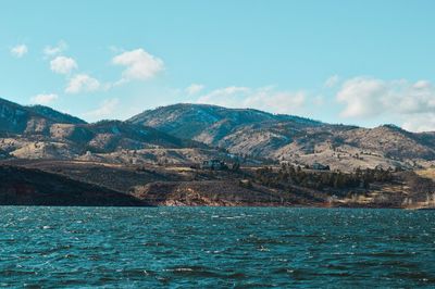 Low angle view of lake against sky