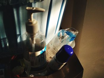 Close-up of glass bottle on table