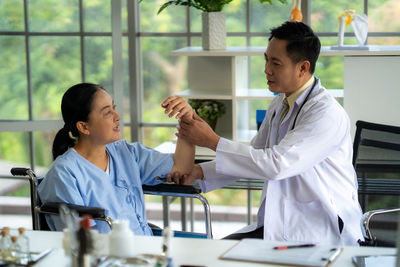 Doctor examining patient