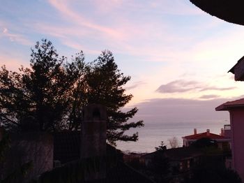 View of buildings at sunset