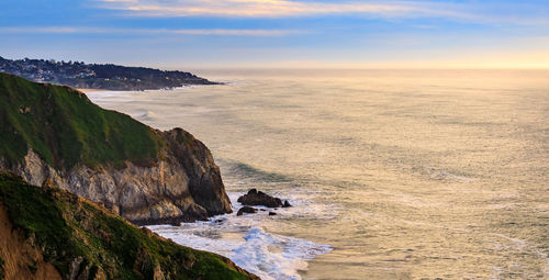 Scenic view of sea against sky during sunset