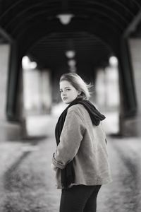 Portrait of woman standing outdoors