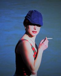 Portrait of young woman in front the sea