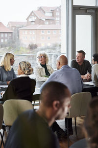 Business people having meeting in boardroom