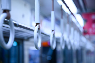 Close-up of handle in subway train