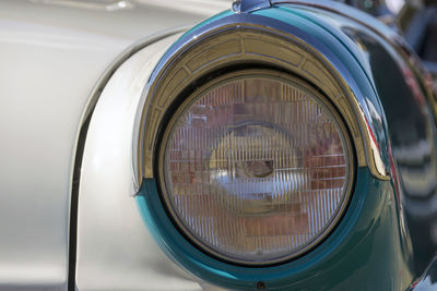 Reflection of car on side-view mirror