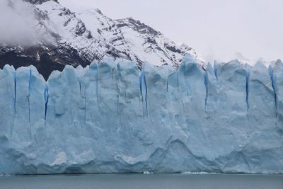 Scenic view of frozen sea against sky