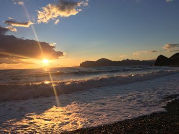 Scenic view of sea against sky during sunset