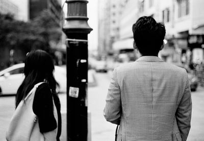 Rear view of man standing in park