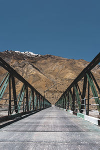 Bridge against clear blue sky