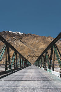 Bridge against clear blue sky