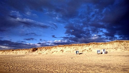 Scenic view of desert against sky