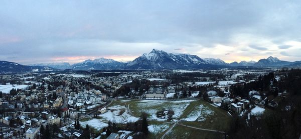 Scenic view of snowcapped mountains against sky during winter