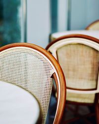 Close-up of empty chair on table