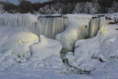 Scenic view of frozen lake during winter