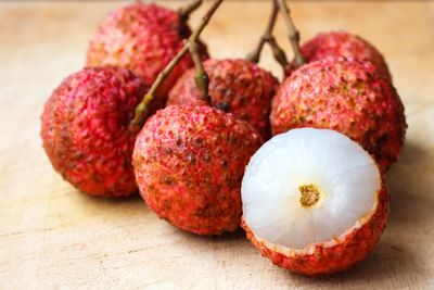 Close-up of lychees on table