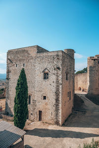 Old ruins against clear blue sky