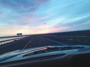 View of road through car windshield