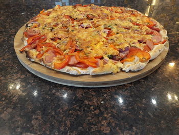 High angle view of pizza in plate on table