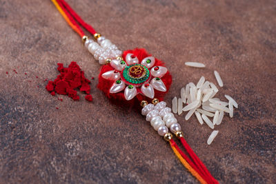 High angle view of red berries on table