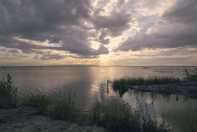 Scenic view of sea against sky during sunset